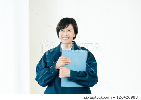 Senior woman in work clothes 126426988