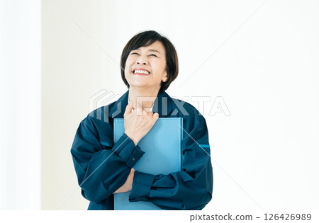 Senior woman in work clothes 126426989