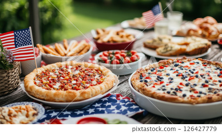 joyful Fourth of July picnic scene featuring delicious food, vibrant colors, and festive decorations, perfect for celebrating with family 126427779