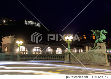 Night view of Dragon bridge over the Ljubljanica river in Ljubljana, Slovenia 126429147