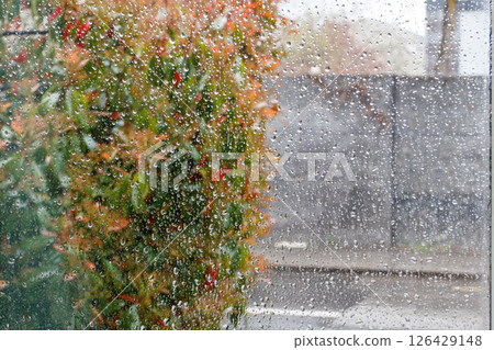 Water drops of rain on a window glass 126429148