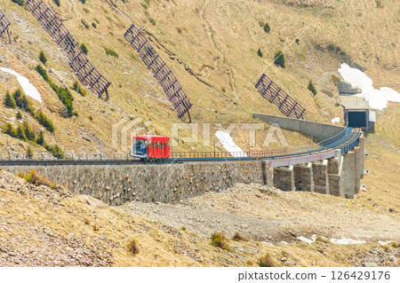 Red funicular to Niesen mountain in Switzerland Red funicular to Niesen mountain in Switzerland 126429176