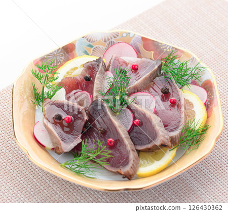 Bonito seared carpaccio 126430362