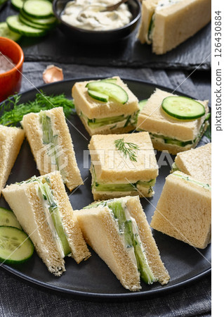 cucumber sandwiches with tasty cream cheese spread 126430884