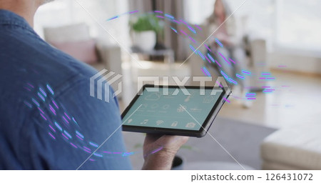 Image of purple shapes moving over caucasian man using tablet with smart home on screen Image of purple shapes moving over caucasian man using tablet with smart home on screen 126431072
