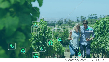 Image of network of eco icons over caucasian couple in vineyard Image of network of eco icons over caucasian couple in vineyard 126431143