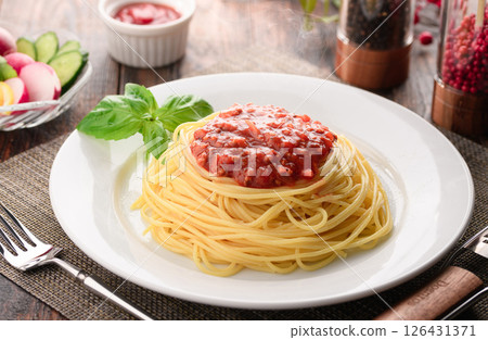 A dish of steaming tomato sauce pasta and sizzling basil (meat sauce pasta) A dish of steaming tomato sauce pasta and sizzling basil (meat sauce pasta) 126431371