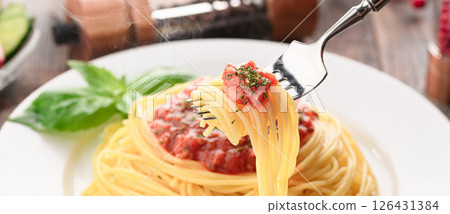 A dish of steaming tomato sauce pasta and sizzling basil (meat sauce pasta) A dish of steaming tomato sauce pasta and sizzling basil (meat sauce pasta) 126431384
