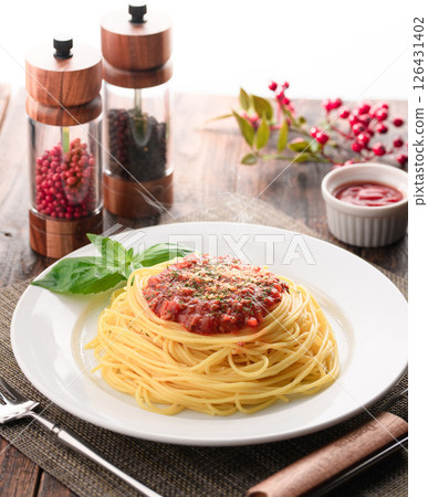 A dish of steaming tomato sauce pasta and sizzling basil (meat sauce pasta) A dish of steaming tomato sauce pasta and sizzling basil (meat sauce pasta) 126431402