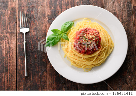 A dish of steaming tomato sauce pasta and sizzling basil (meat sauce pasta) A dish of steaming tomato sauce pasta and sizzling basil (meat sauce pasta) 126431411