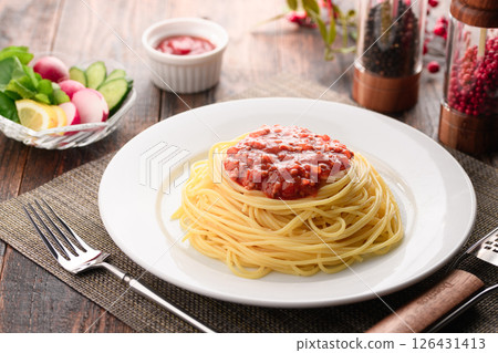 A dish of steaming tomato sauce pasta and sizzling basil (meat sauce pasta) 126431413