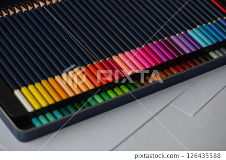 Set of two rows of colored pencils in a pencil case Set of two rows of colored pencils in a pencil case 126435588