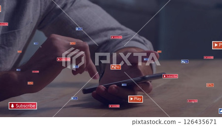 Image of media icons over biracial man using smartphone at home Image of media icons over biracial man using smartphone at home 126435671