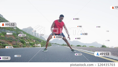 Image of media icons over biracial man exercising Image of media icons over biracial man exercising 126435703