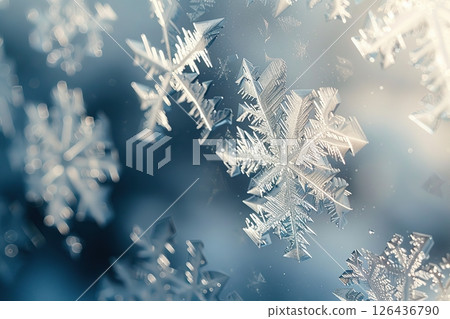 Winter frost patterns on glass. Ice crystals. Abstract light blank cold winter background or wallpaper. Frost patterns on frozen window. Frosted glass. Freezing effect. Frostwork. Harsh season. Cold 126436790