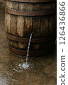 Water leaking from a barrel 126436866