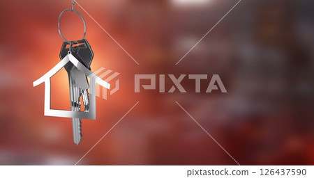 House-shaped keychain image over blurred red background House-shaped keychain image over blurred red background 126437590