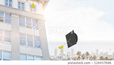 Graduation caps image over cityscape and building background 126437686