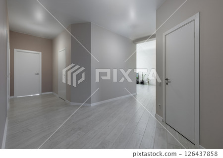 Modern minimalist hallway in contemporary apartment Modern minimalist hallway in contemporary apartment 126437858