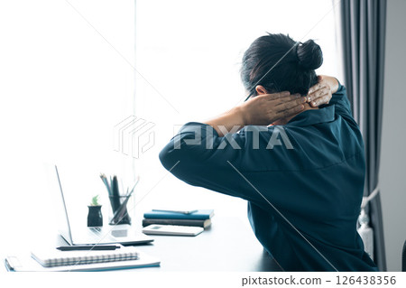 She sought medical advice for the ache in her shoulder, concerned it might indicate a muscle injury or underlying health problem affecting her body. ache, medical, pain, health, problem, shoulder. 126438356