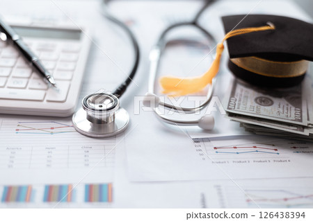 Earning degree in medicine requires significant saving and investment in education with careful financial planning crucial for aspiring doctors navigating banking and money management during studies. Earning degree in medicine requires significant saving and investment in education with careful financial planning crucial for aspiring doctors navigating banking and money management during studies. 126438394