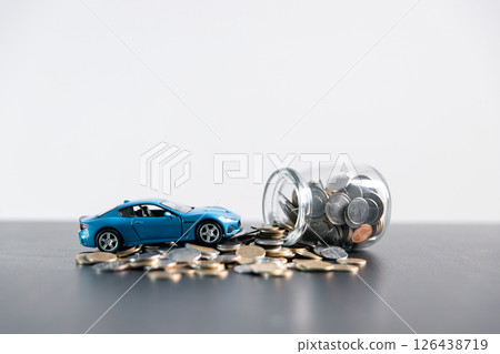 Securing loan for car involves understanding finance options, insurance requirements and overall cost, making it crucial business concept in auto industry impacts final price and money management. 126438719