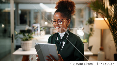 Office, businesswoman and online with tablet for reading, news information and blog post at night. Late, female person and copywriter with digital for research, article website and smile for deadline 126439037