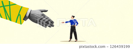Large hand in yellow sleeve reaches out to woman in blue shirt for handshake. Deal. 126439199