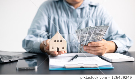 Real estate agent helped the client secure a mortgage loan for their property investment, ensuring the contract was properly handled by the broker. investment, property, estate, loan, real, mortgage. Real estate agent helped the client secure a mortgage loan for their property investment, ensuring the contract was properly handled by the broker. investment, property, estate, loan, real, mortgage. 126439249