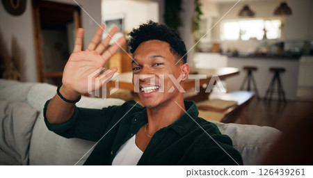 Man, wave and live streaming in home with portrait, influencer or content creation with greeting in picture. Video call, selfie and person with memory, update or hello for broadcast on social media 126439261