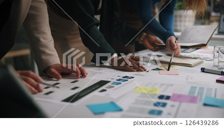 Night, business and hands of people with documents for planning, campaign management and agenda in office. Company team, workshop and sticky notes in workplace with paperwork, meeting and late tasks 126439286