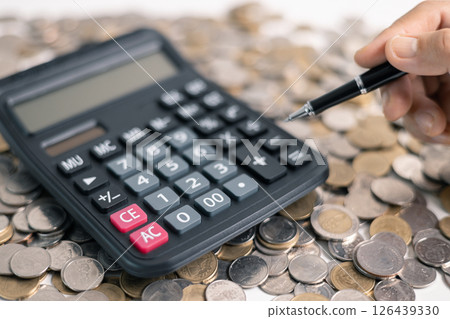 Effective finance management involves strategic investment and saving practices to foster growth in money, with careful accounting of coins and currency essential for a thriving business and economy. 126439330