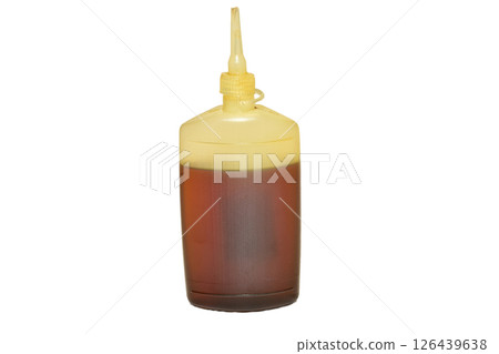 A bottle of machine oil. 126439638