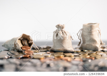 Bank finance department managed economy currency flow, overseeing investments, money transactions, cash reserves, and business banking to mitigate debt. finance, bank, currency, economy, investment. 126439694