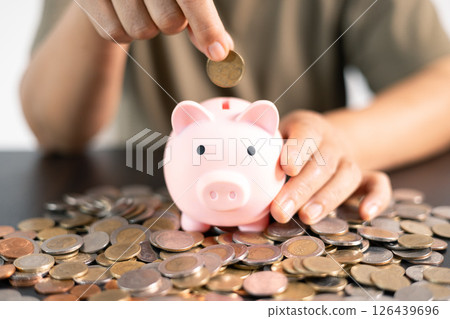 Smart investment in currency can grow your wealth, as saving money, managing tax efficiently, and securing loans are essential for financial growth. currency, investment, money, saving, tax, wealth. 126439696