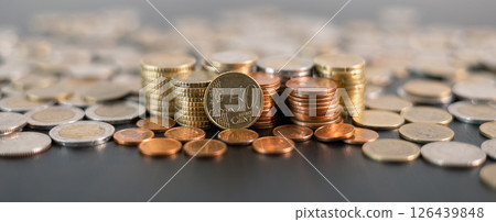 Stack of coins symbolizes core principles of finance, from saving and investment to business and banking, reflecting vital role currency plays in economy and management of money. finance, investment. Stack of coins symbolizes core principles of finance, from saving and investment to business and banking, reflecting vital role currency plays in economy and management of money. finance, investment. 126439848