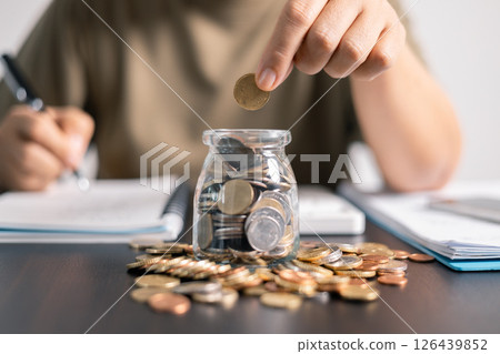 Proper management of finance involves balancing income and savings, strategically using coins and money for investments and loans, to optimize business budget and maximize earning potential. 126439852