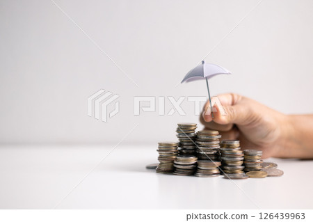 Concept of life insurance offers essential protection for family financial stability, covering medical and health care services to ensure their well-being. insurance, family, life, protection, money. 126439963