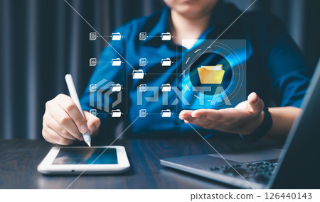Corporate enterprises manage their information efficiently by organizing online documents and files into a secure cyberspace database and folder management system. cyberspace, document, folder, corp 126440143