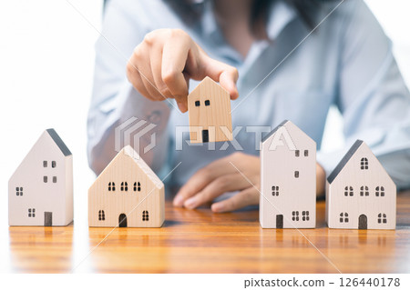 Real estate agent can help you navigate complexities of property investment, finance and securing mortgage loan for your next business venture or sale. estate, real, investment, agent, finance. 126440178