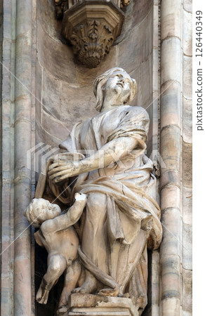 Statue of Saint on the facade of the Milan Cathedral, Duomo di Santa Maria Nascente, Milan, Lombardy, Italy 126440349