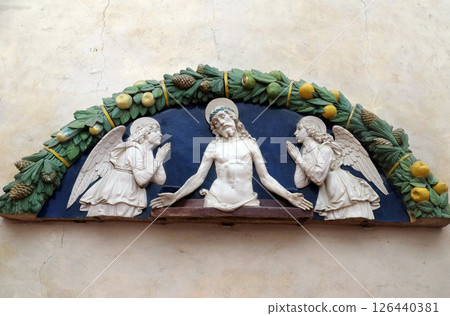 Christ in Pieta with two angels in Adoration, lunette, bas relief by Andrea della Robbia from Medici Chapel, Basilica di Santa Croce (Basilica of the Holy Cross) in Florence, Italy 126440381