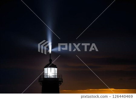 Lighthouse Silhouette at Night 126440469