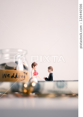 Woman carefully manages her wedding fund, making payments from her bank account and using credit wisely, with the background of sound financial plan supporting her marriage and business commitments. Woman carefully manages her wedding fund, making payments from her bank account and using credit wisely, with the background of sound financial plan supporting her marriage and business commitments. 126440566