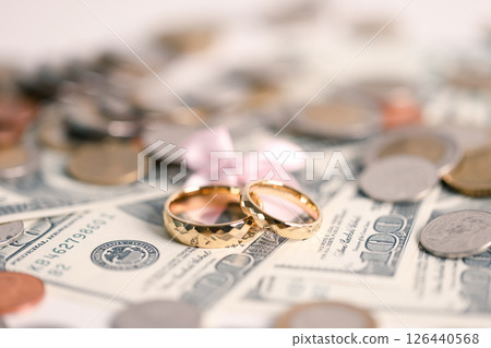 Woman carefully manages her wedding fund, making payments from her bank account and using credit wisely, with the background of sound financial plan supporting her marriage and business commitments. Woman carefully manages her wedding fund, making payments from her bank account and using credit wisely, with the background of sound financial plan supporting her marriage and business commitments. 126440568