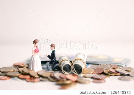 Woman carefully manages her wedding fund, making payments from her bank account and using credit wisely, with the background of sound financial plan supporting her marriage and business commitments. 126440573