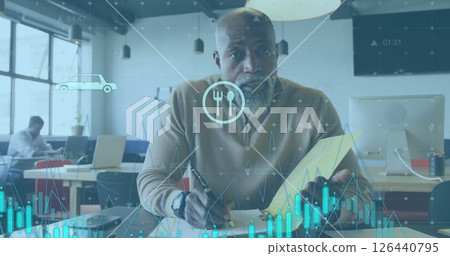 Image of financial data processing over african american businessman having image call in office 126440795