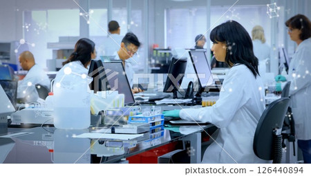 Image of scientific data processing over diverse scientists in laboratory 126440894