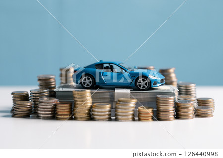 Buy a car, save money and consider the total fiscal value, market worth, and insurance costs. car, money, save, insurance, buy, fiscal, worth, market, total, value, concept. 126440998