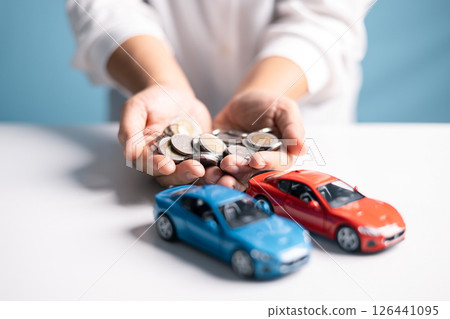 Buy your dream car, save money, understand the automotive industry, compare vehicle prices, and secure a loan. car, money, save, industry, dream, automotive, buy, price, loan, vehicle. 126441095